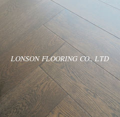 dark stained White Oak  herringbone/fishbone engineered wood flooring