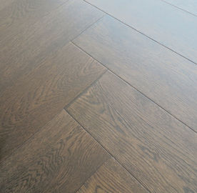 dark stained White Oak  herringbone/fishbone engineered wood flooring